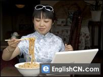A woman using chopsticks